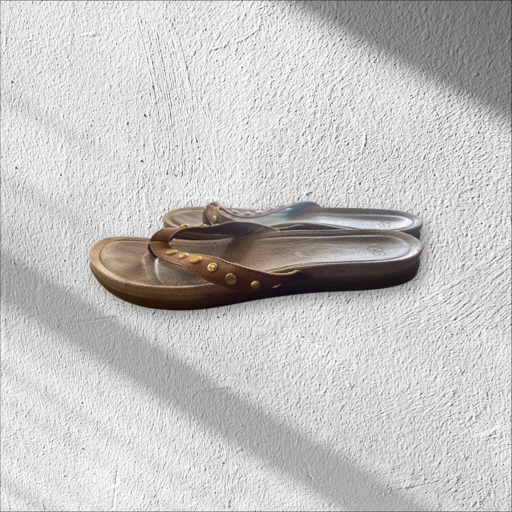 Ugh sandals with tan strap and gold round accents